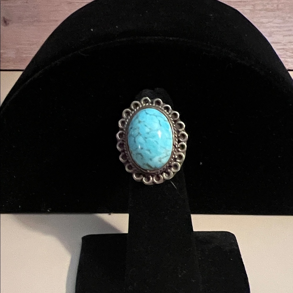 Turquoise Oval Ring with Silver Detailing